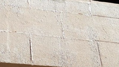 如何解決外墻水包水出現(xiàn)泛白、龜裂問題?